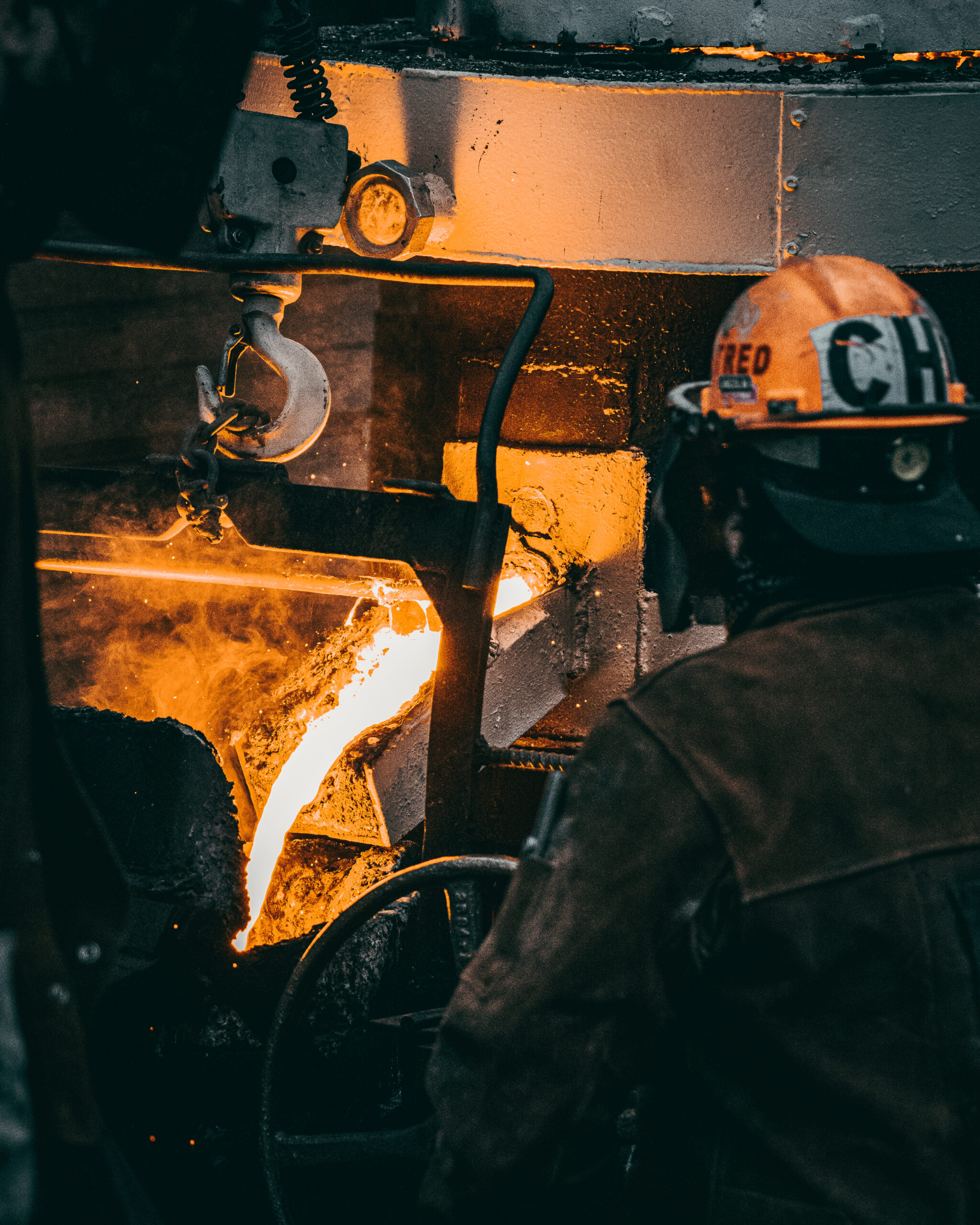 vertical-shot-adult-industrial-worker-uniforms-melting-metal-factory vertical-shot-adult-industrial-worker-uniforms-melting-metal-factory